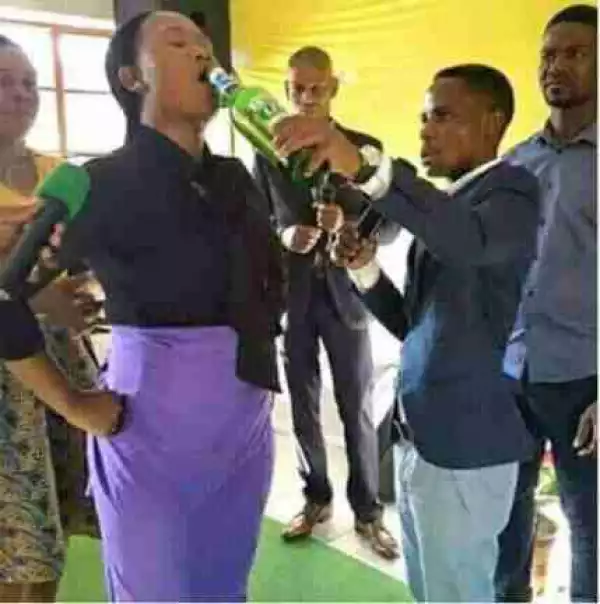 Viral Photo of Pastor Giving Female Church Members Bottle of Beer During Deliverance